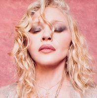Madonna Comes Home To Warner Records